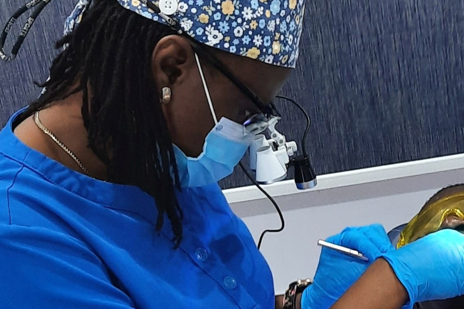 Teeth Whitening at Klarity Dental - Doctor attending to patient